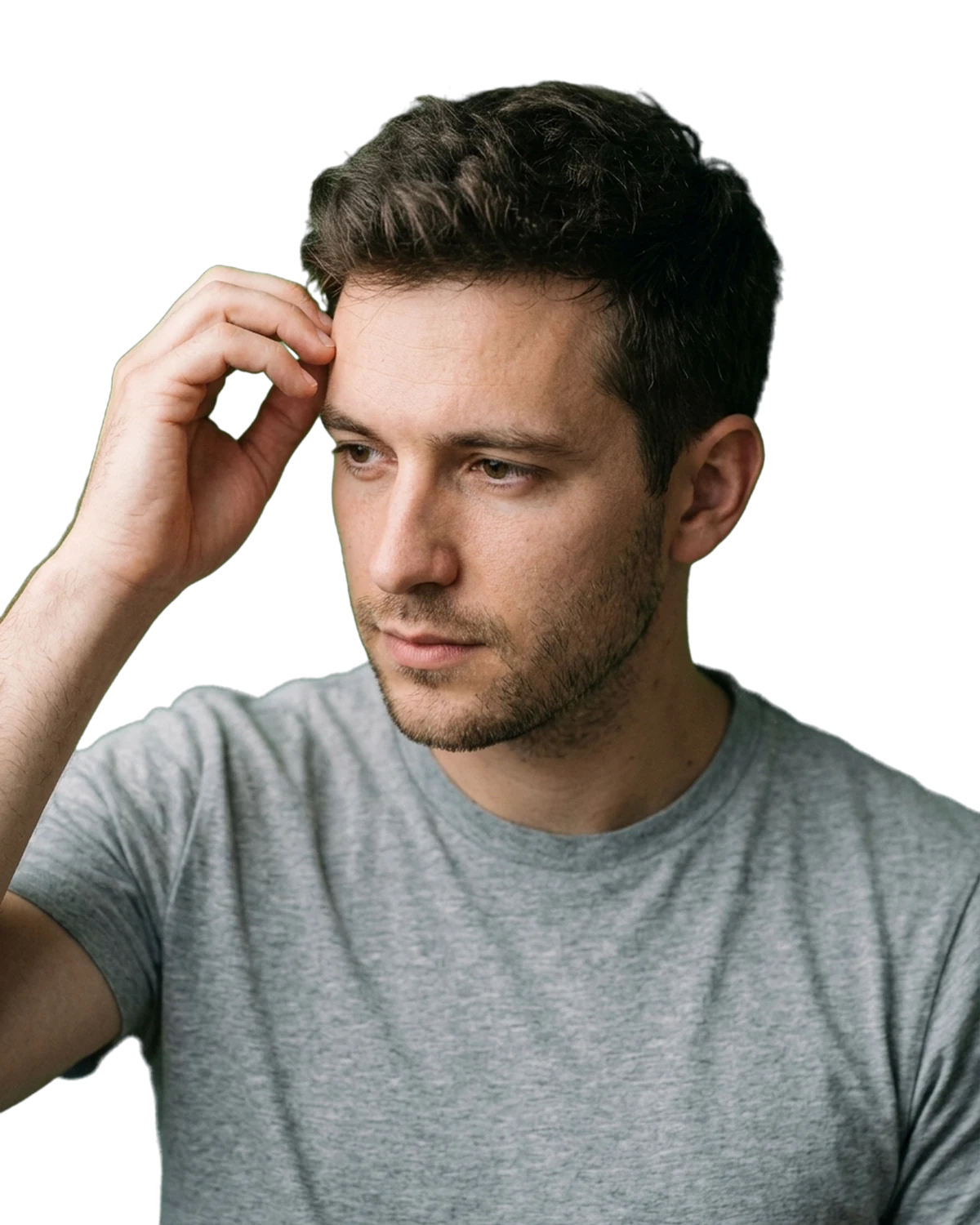 Man with short dark brown hair touching his hairline while checking his hair, an illustrative photo